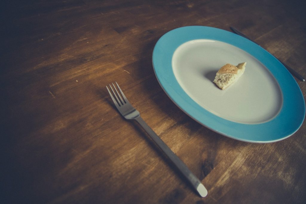 piece of bread on plate for intermittent fasting